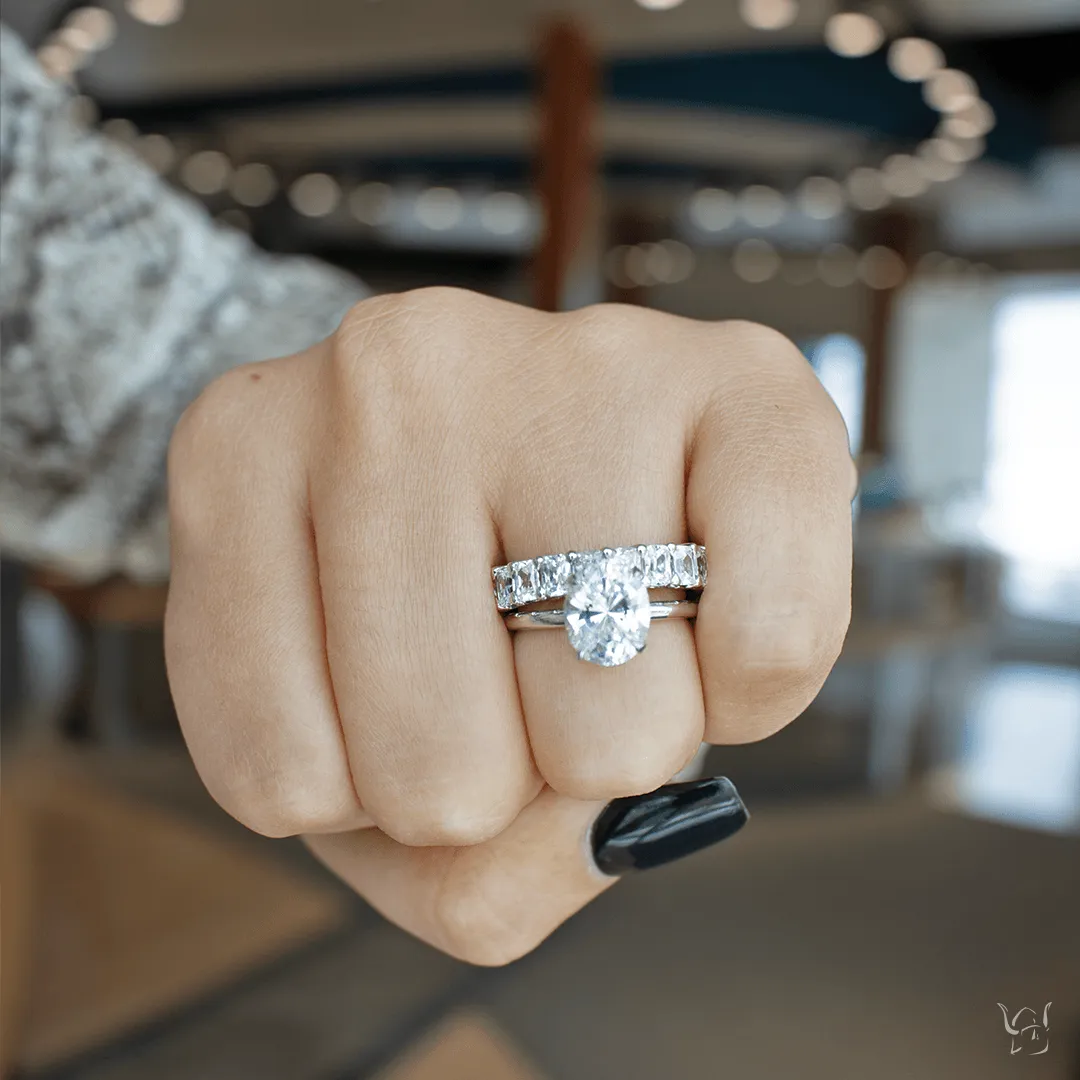 0.11ctw Oval-Cut Diamond Solitaire