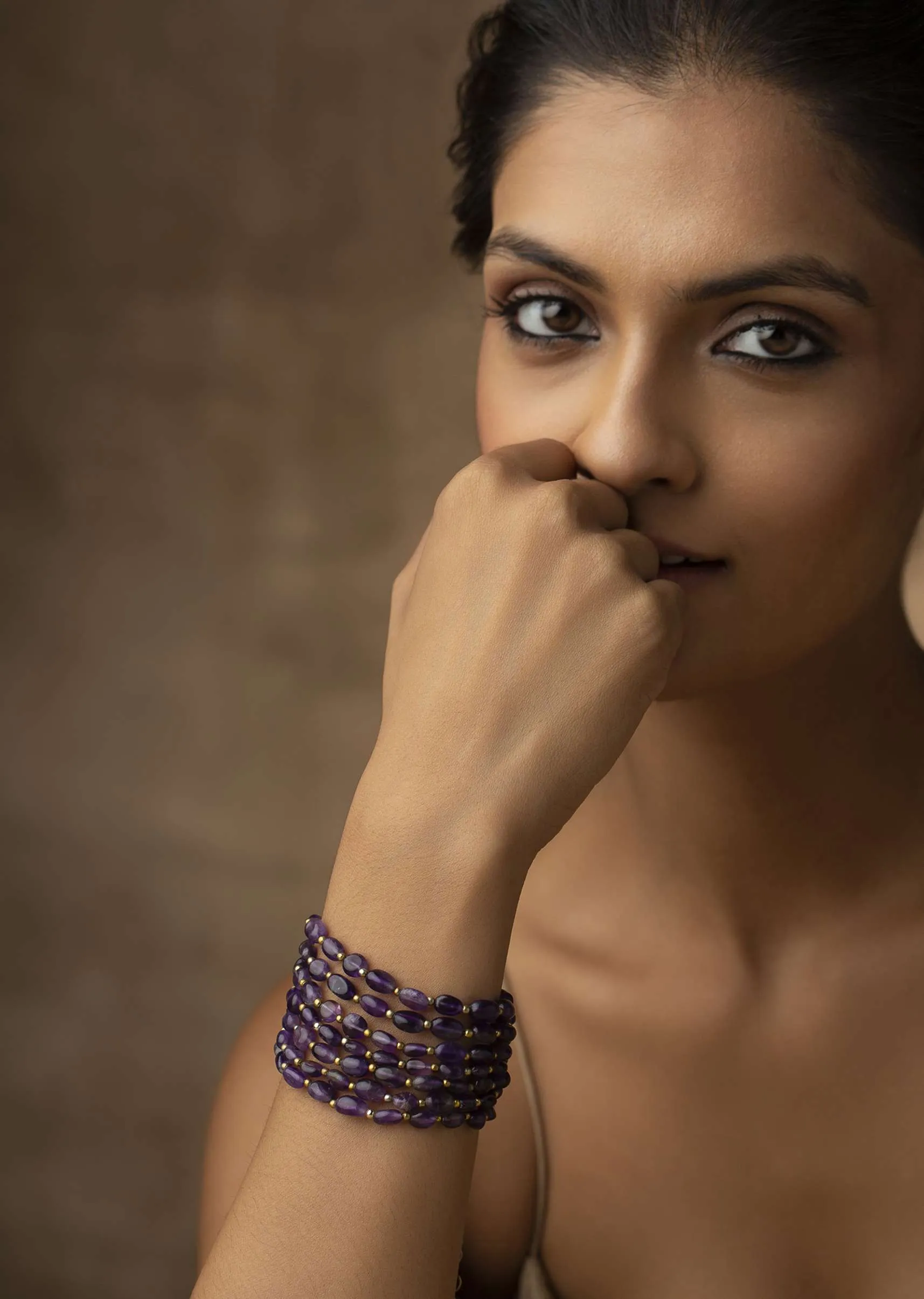 Gold Plated Bracelet Adorned With Purple Amethyst Stones