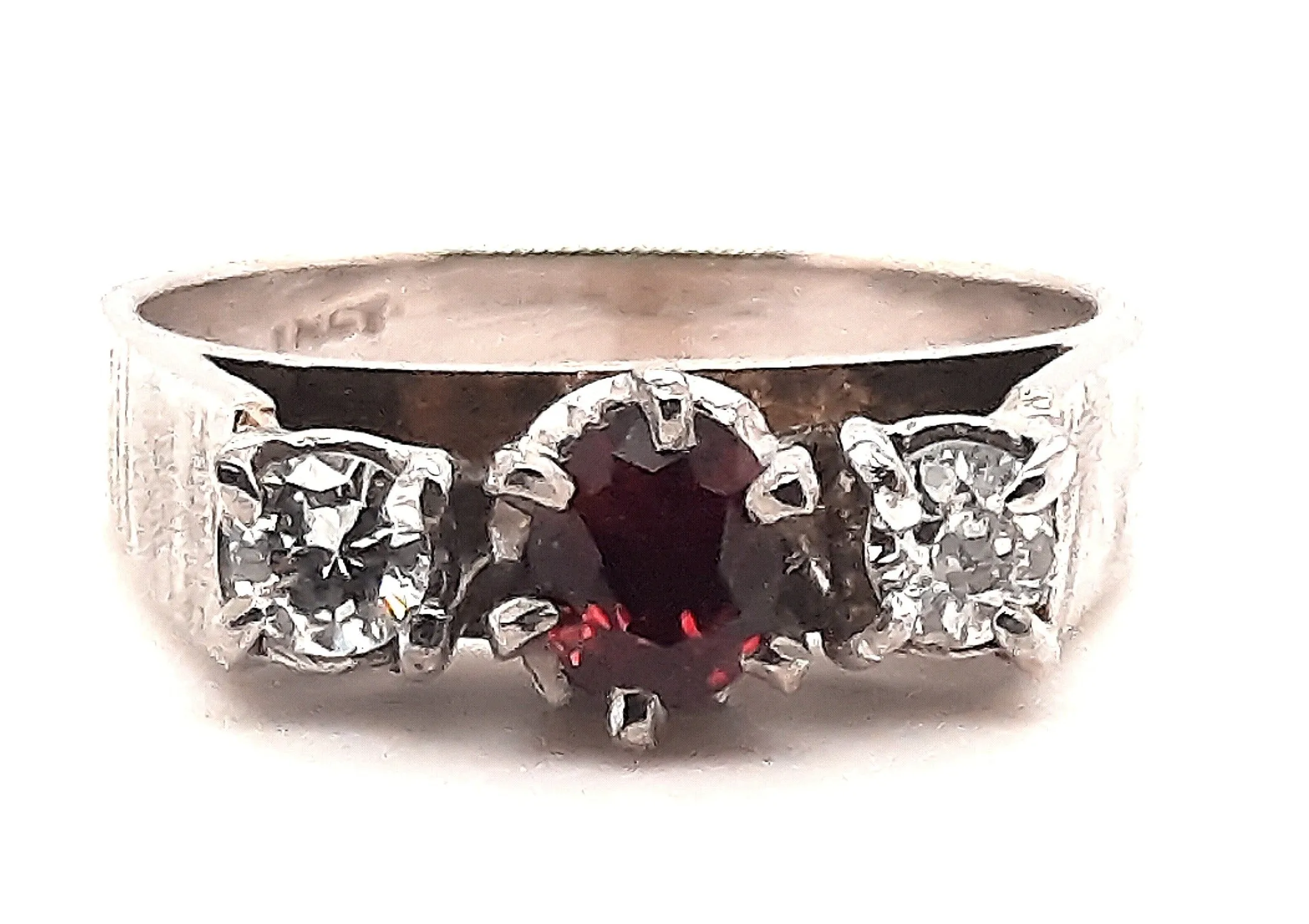Ruby & Diamond Ring set in 18ct White Gold